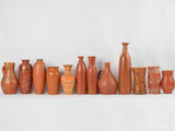 Collection of 12 ocher vases & pitchers 7" - 17"