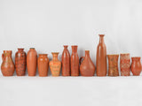 Collection of 12 red ocher vases & pitchers 7" - 17"