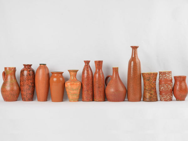 Collection of 12 red ocher vases & pitchers 7" - 17"