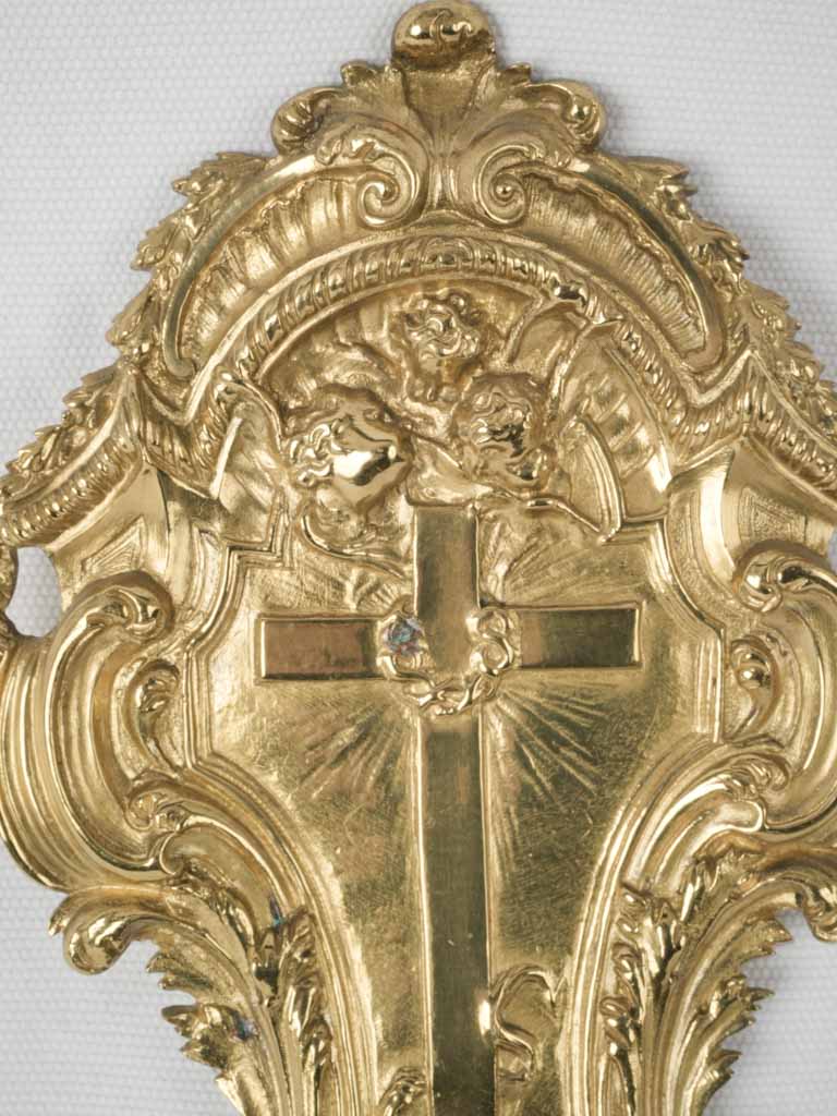 Religious 18th-century cherub holy water stoup
