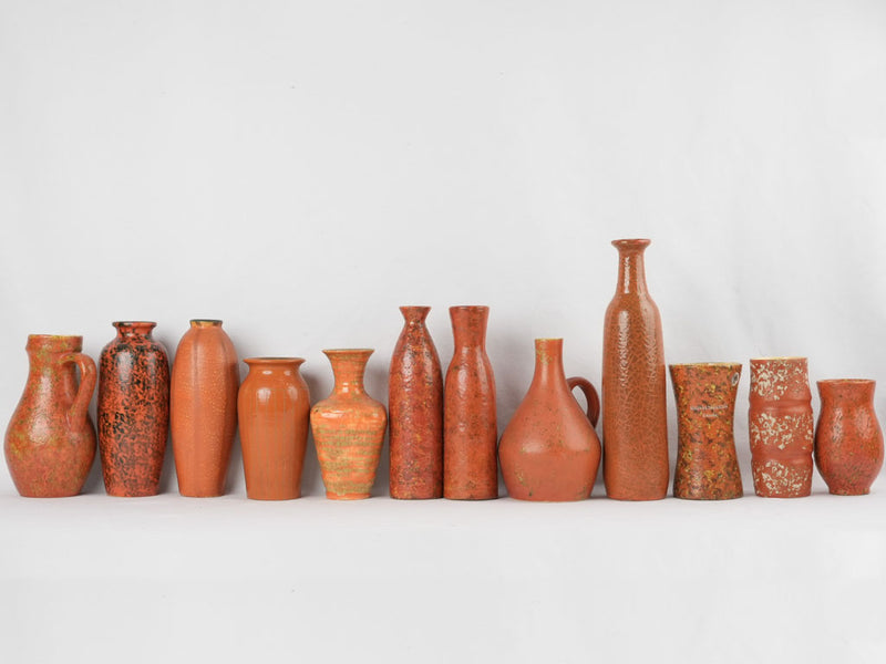 Collection of 12 red ocher vases & pitchers 7" - 17"