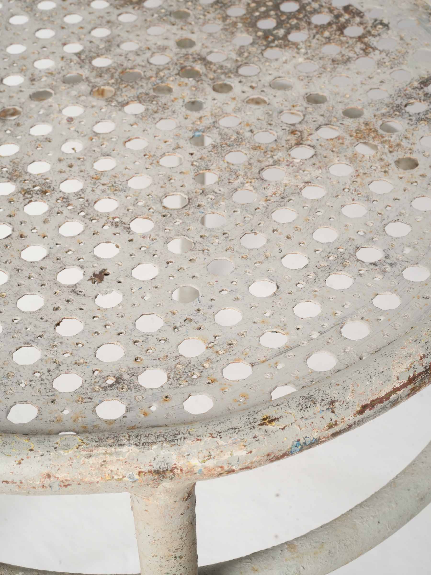 Distressed metal canework dining set  