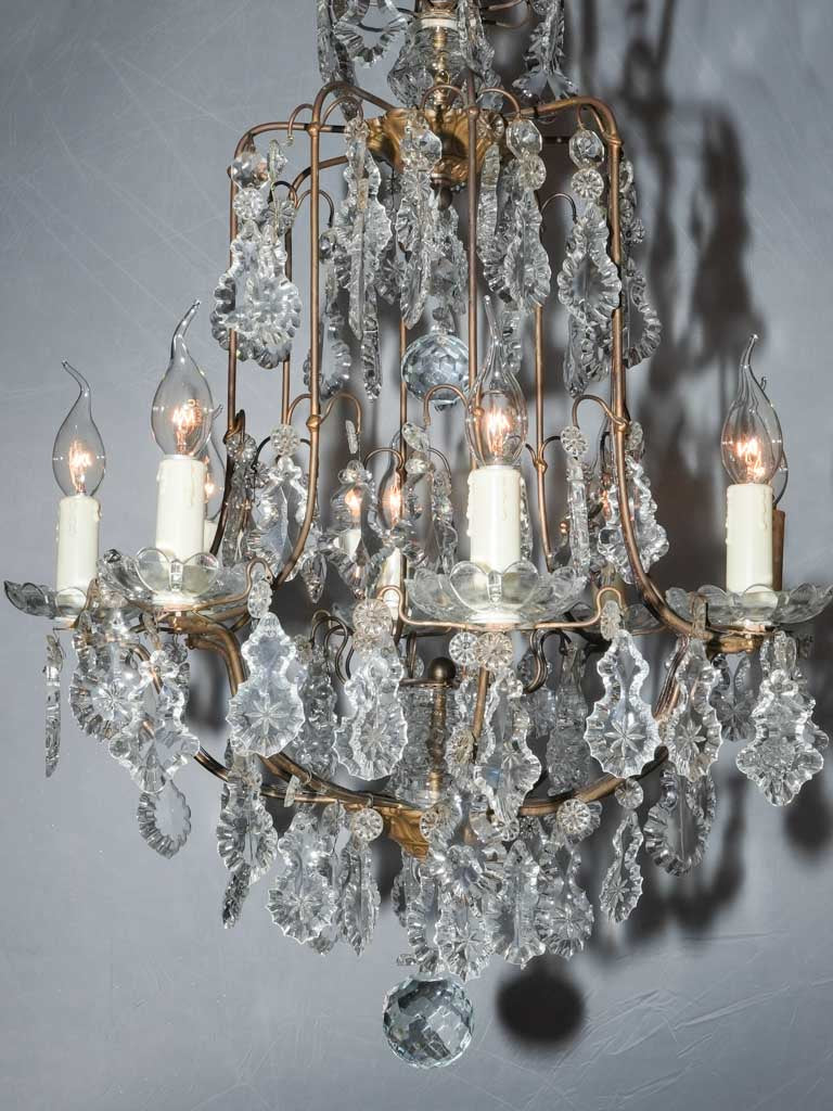Antique crystal-adorned chandelier from France