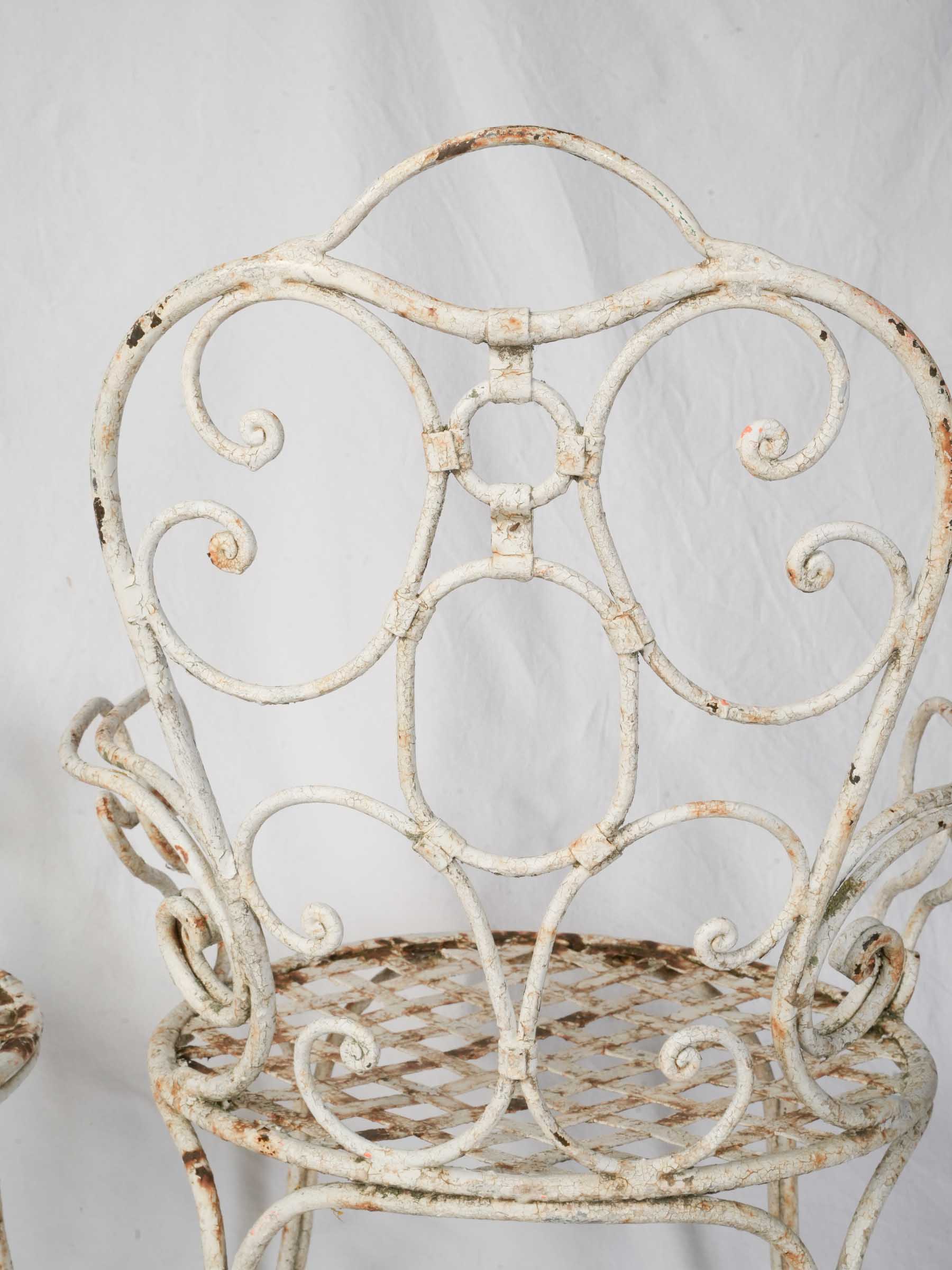 Finely crackled painted garden chairs  