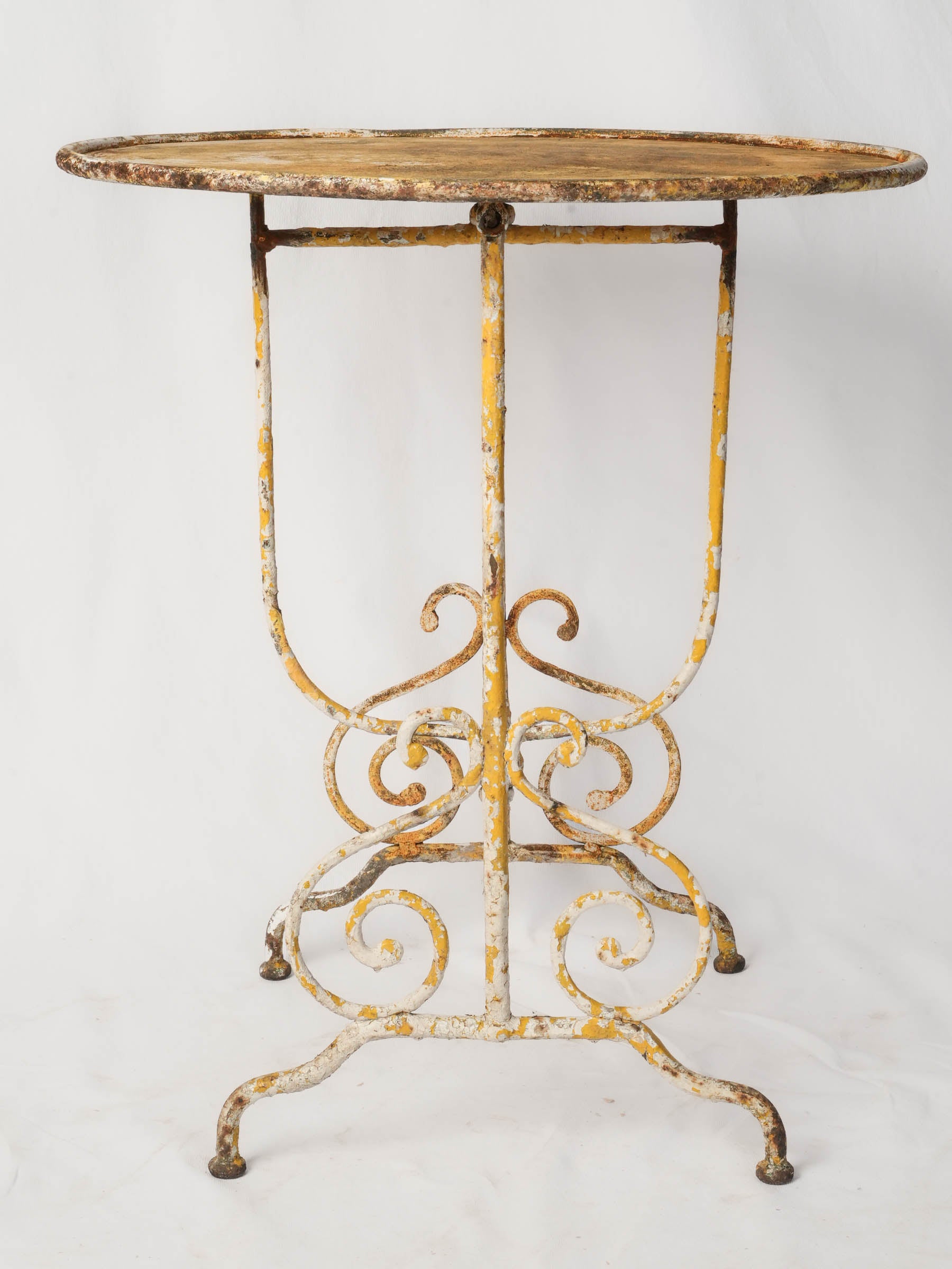 Ornate arabesque scrollwork iron table  