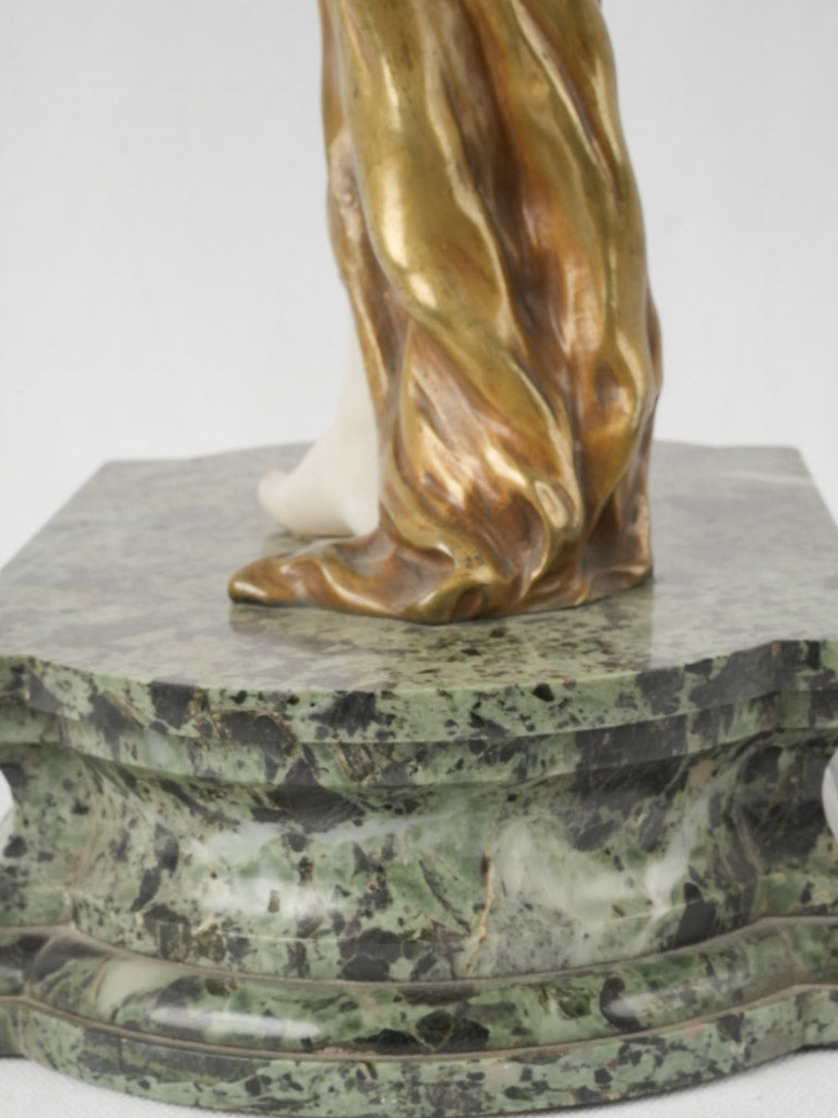 Sculpted green marble base statue