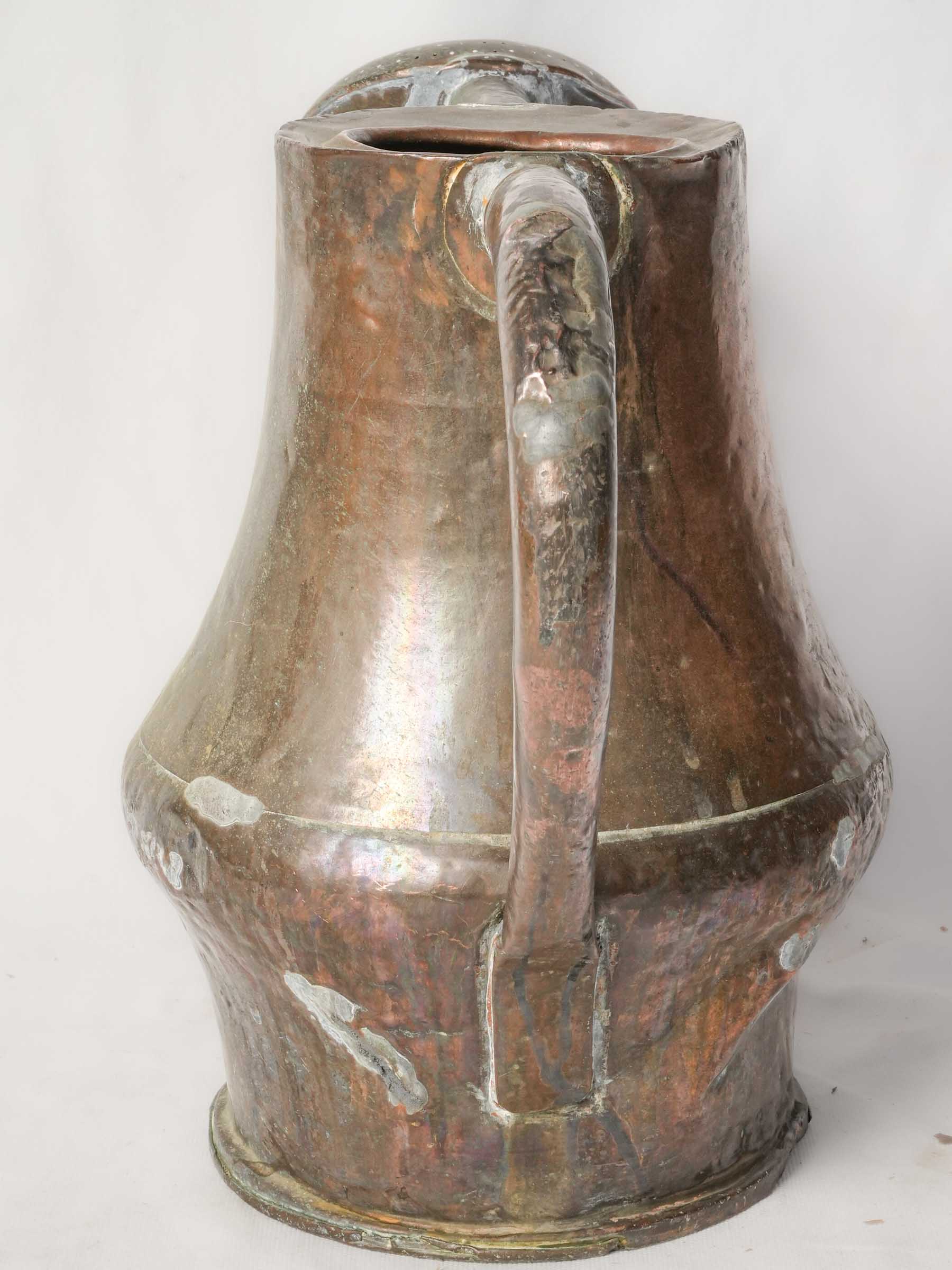 Textured hammered copper watering can