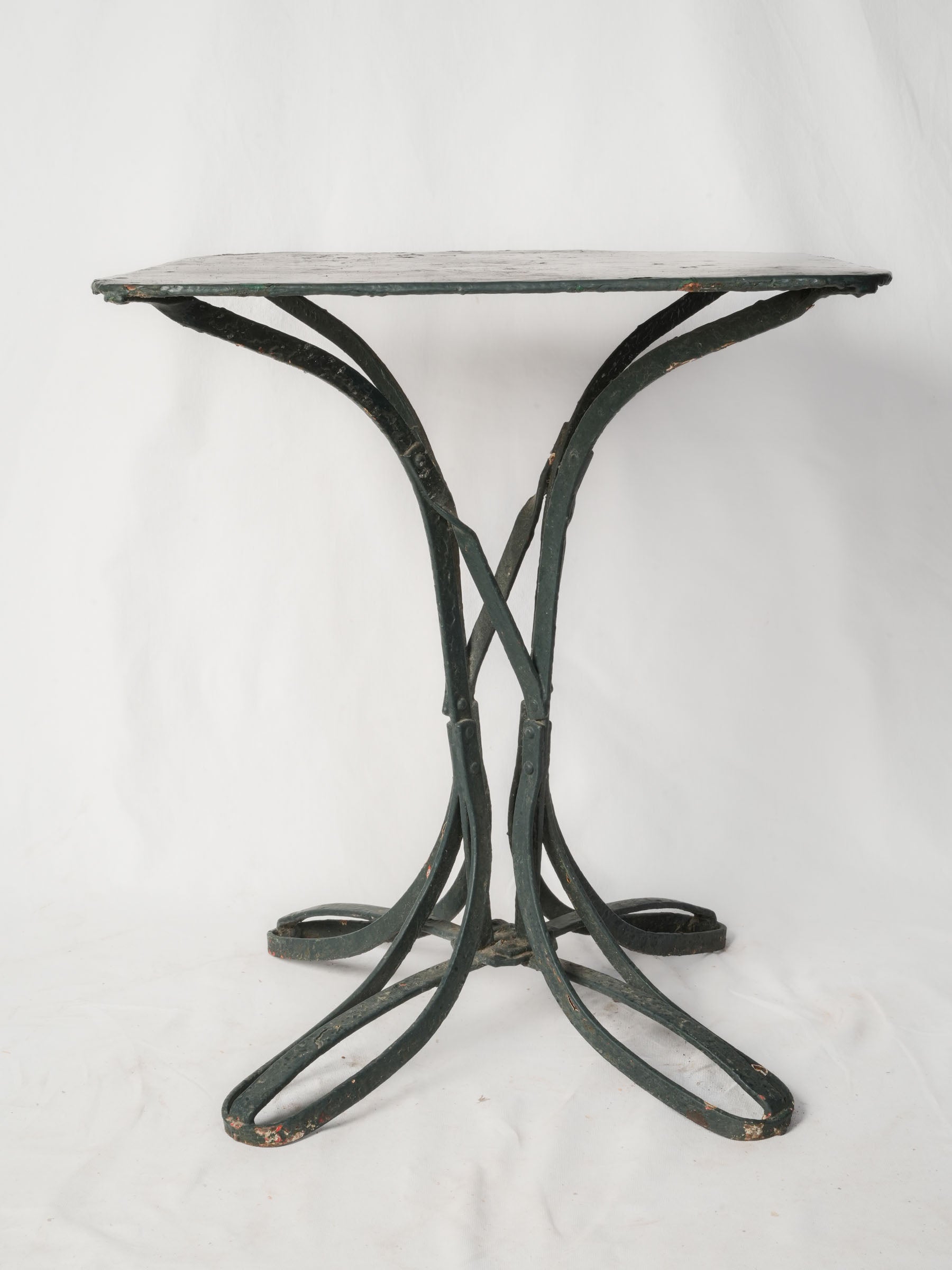 Sculptural antique iron café piece