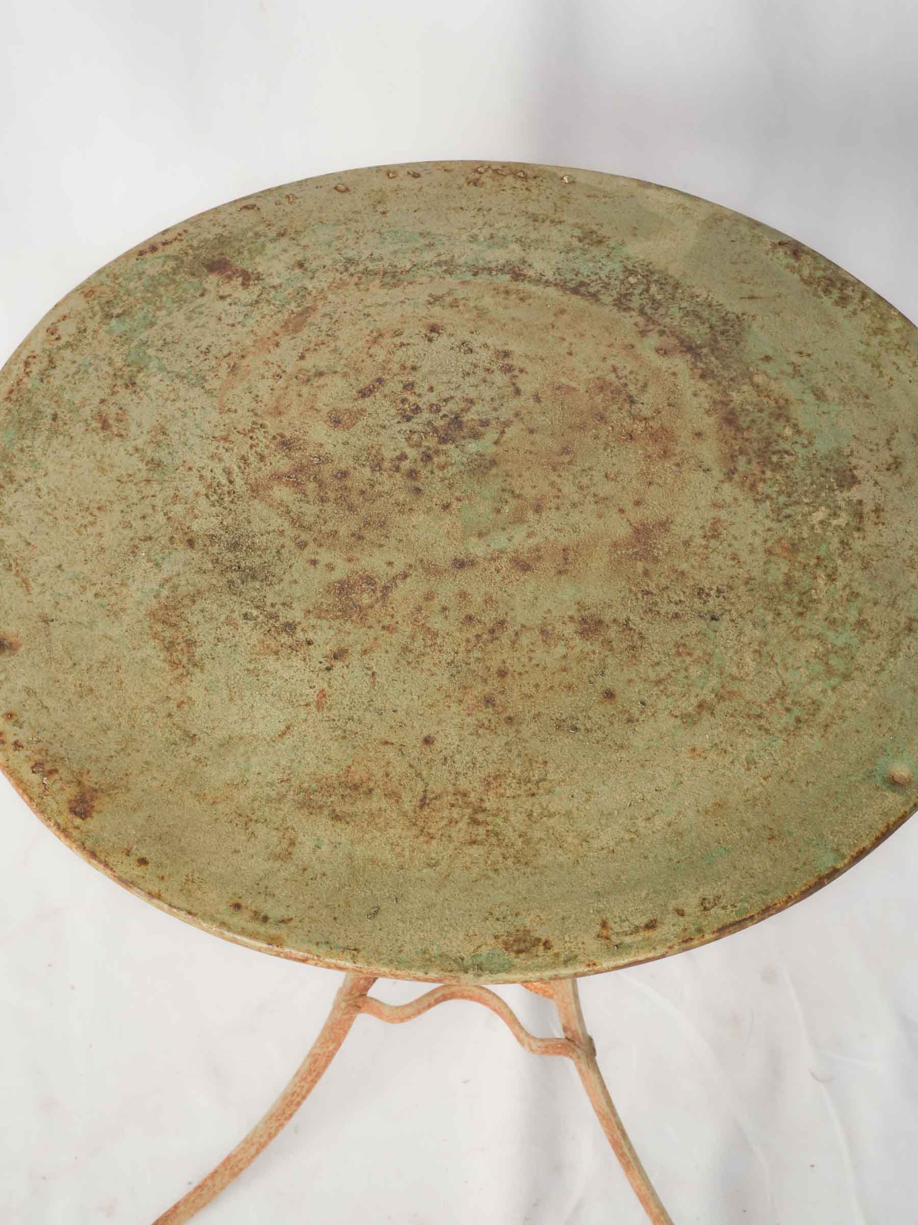 Timeworn French iron guéridon table