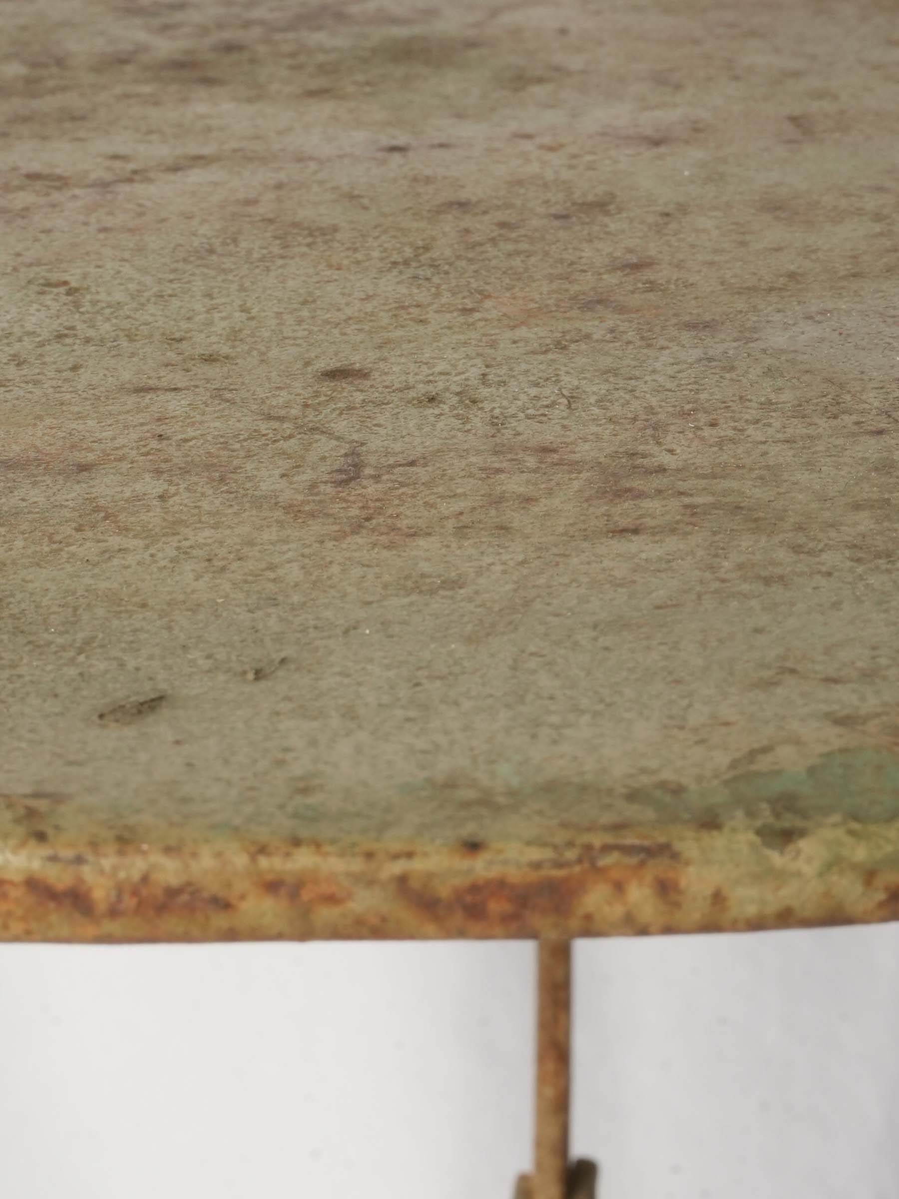 Faded olive paint French table