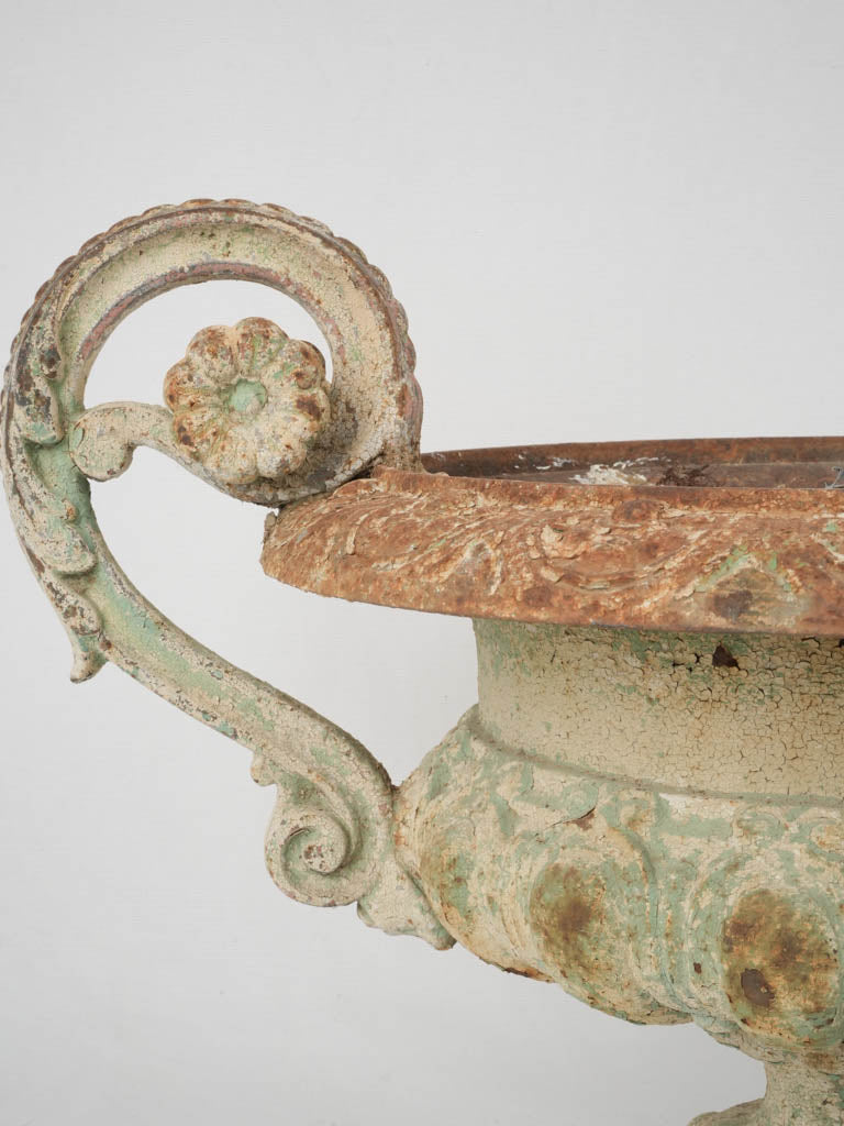 Ornate 19th-century decorative iron urns
