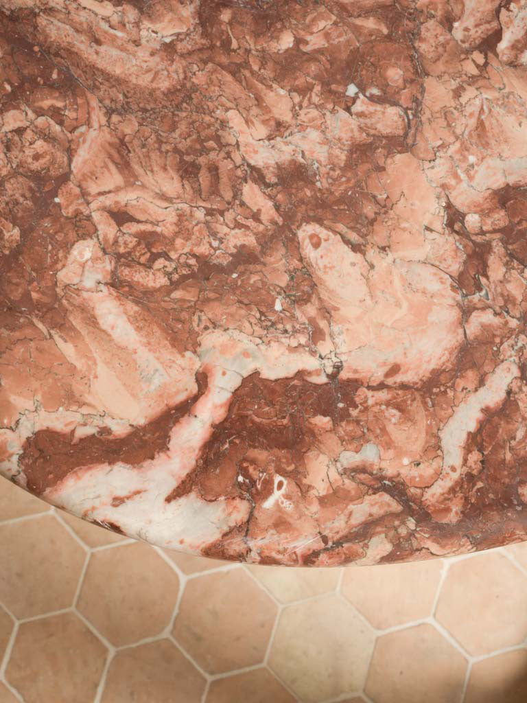 Warm-toned marble dining table  