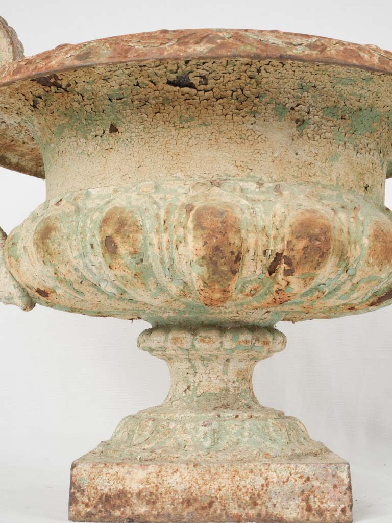 Durable riveted cast iron urns