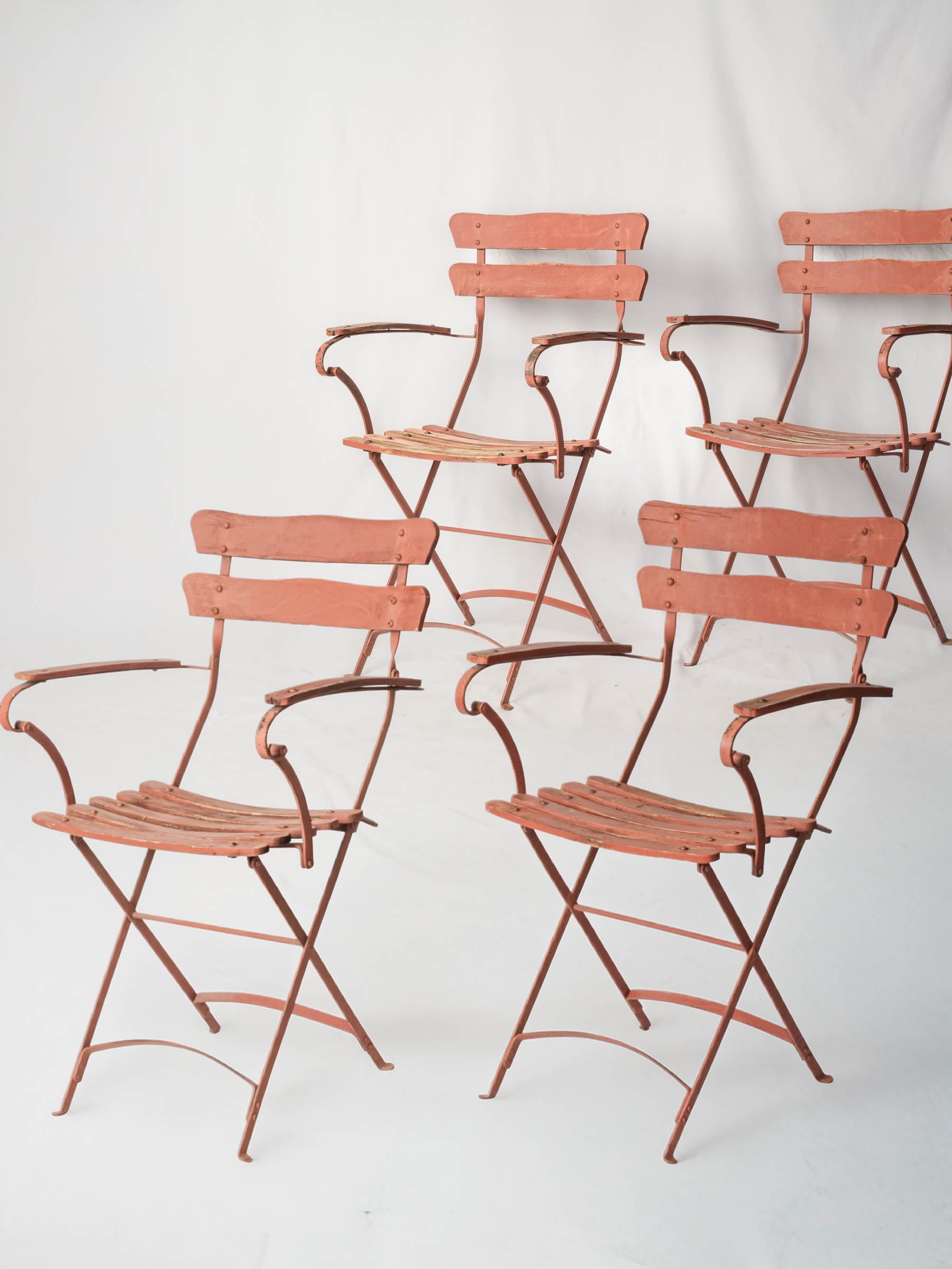 Antique wrought iron garden armchairs