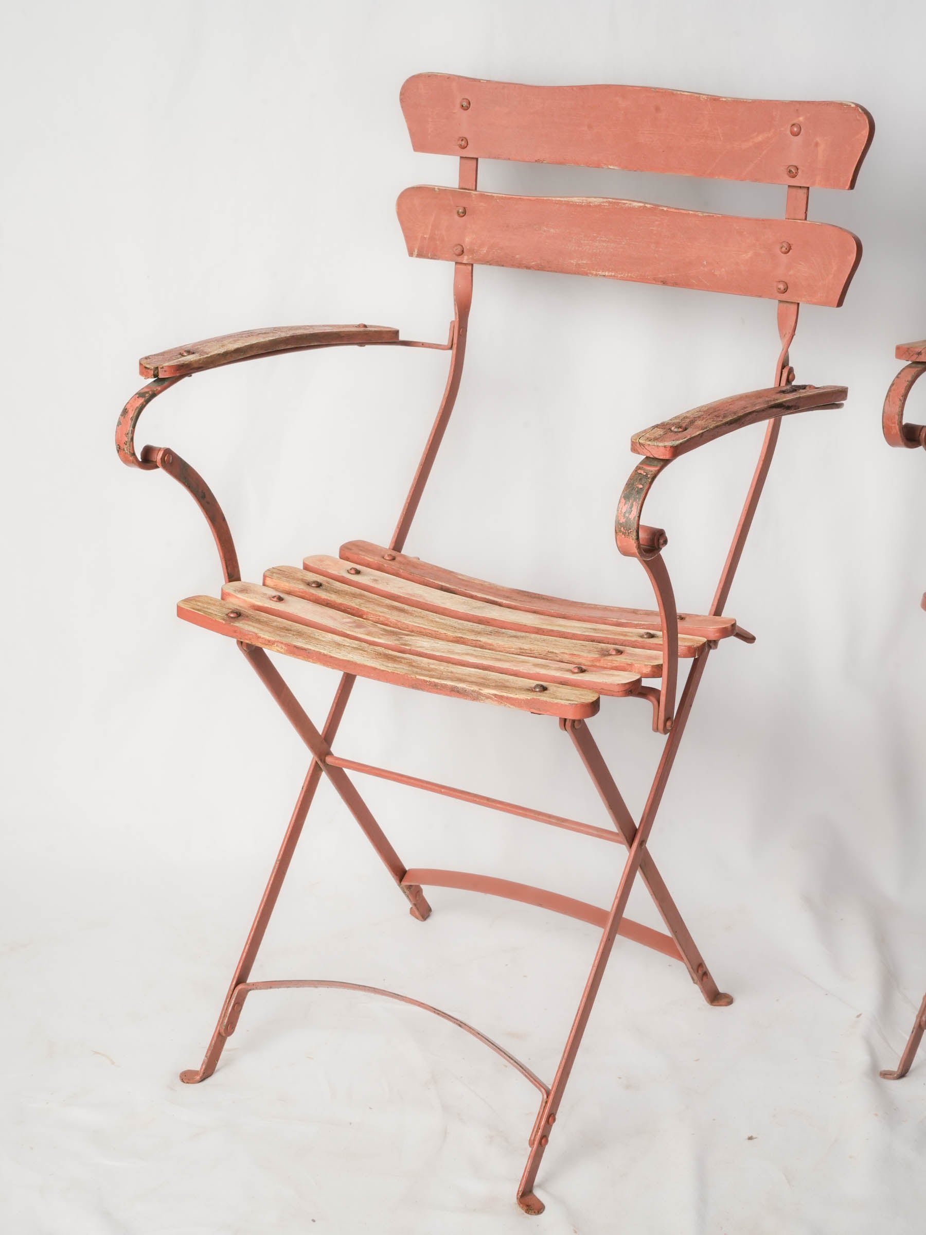Graceful aged finish patio chairs