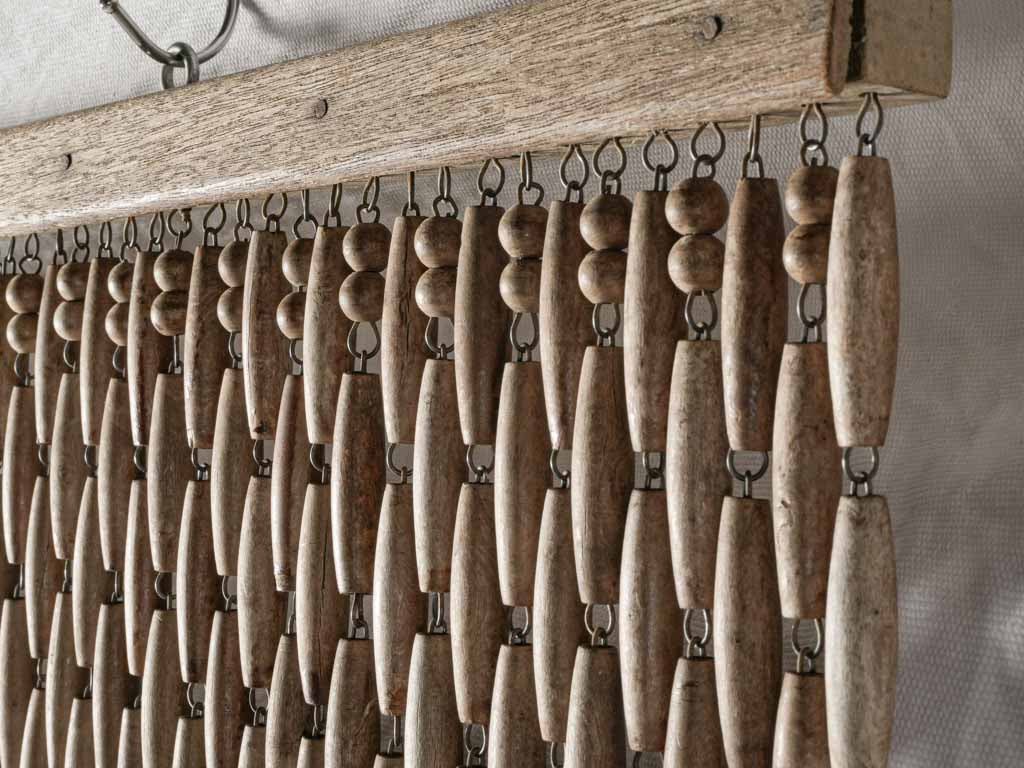 Architectural beaded doorway curtain