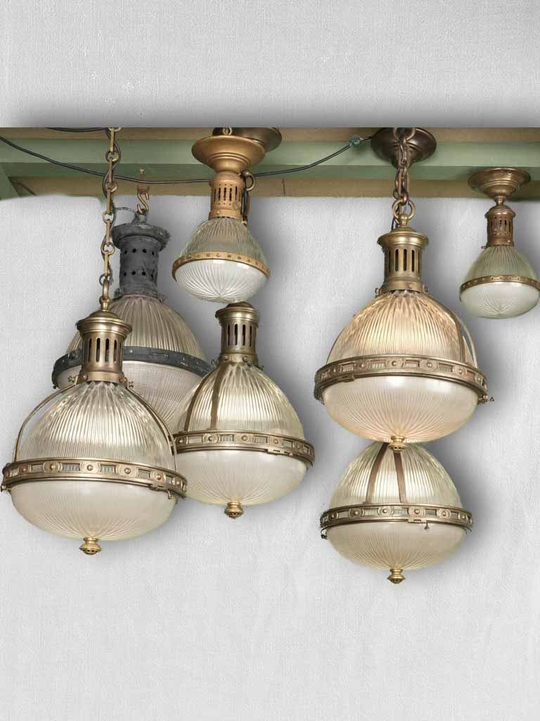 Collection of 7 holophane balloon suspension lights - 1920s