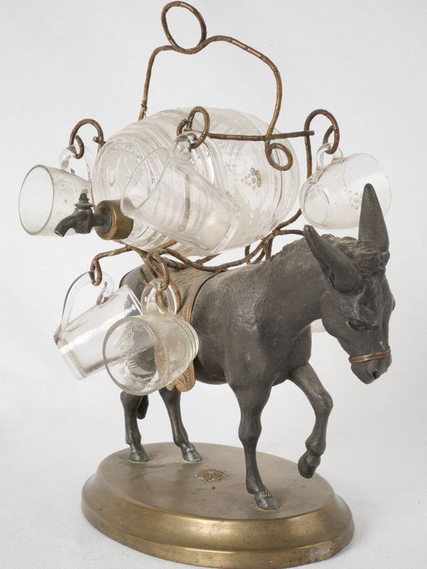 Antique ormolu-finished donkey liqueur stand
