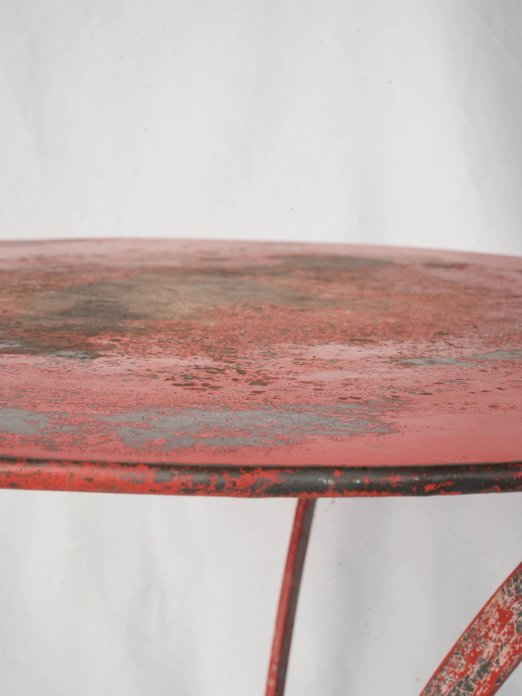 Vividly weathered red garden table