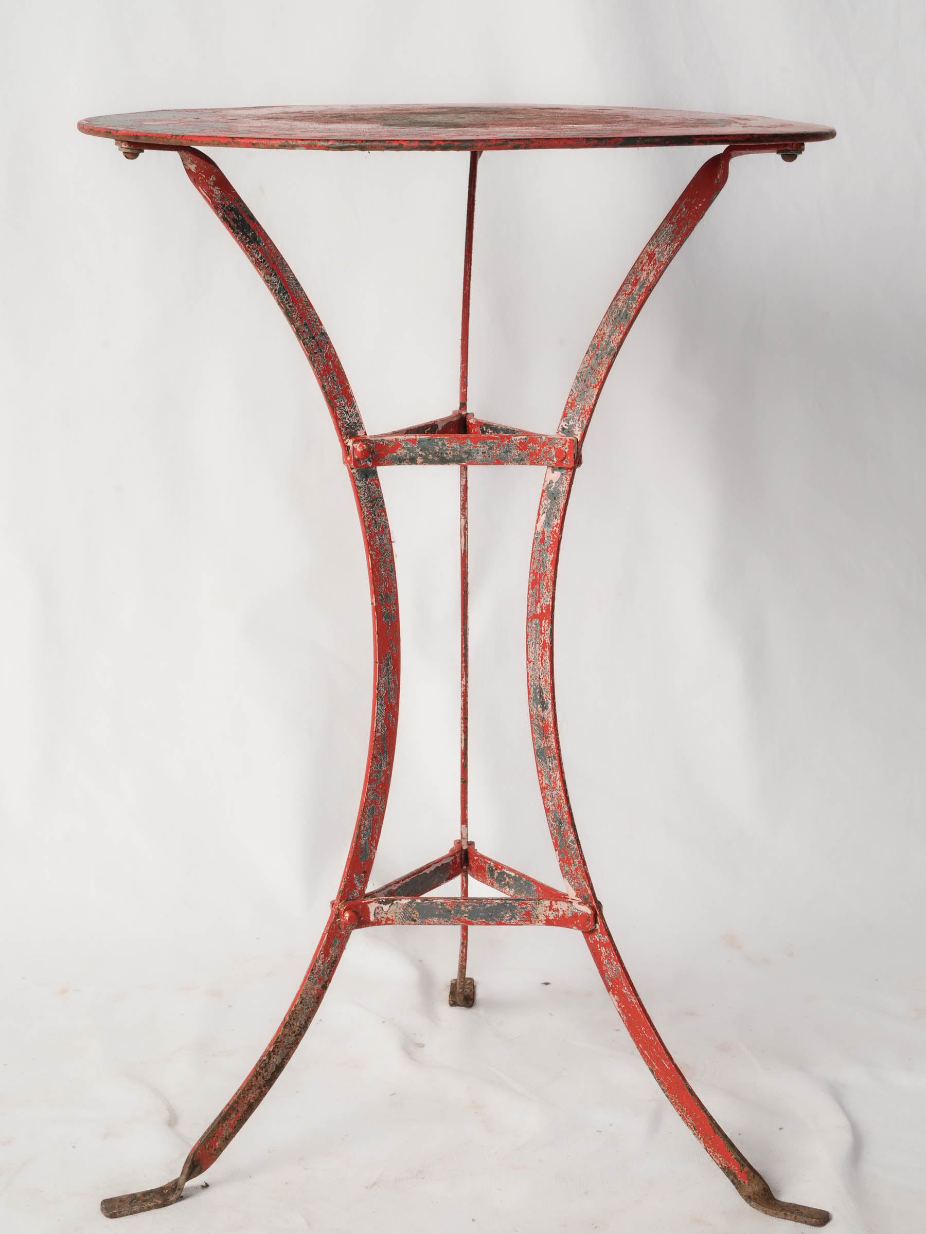 Timeworn weathered red café table