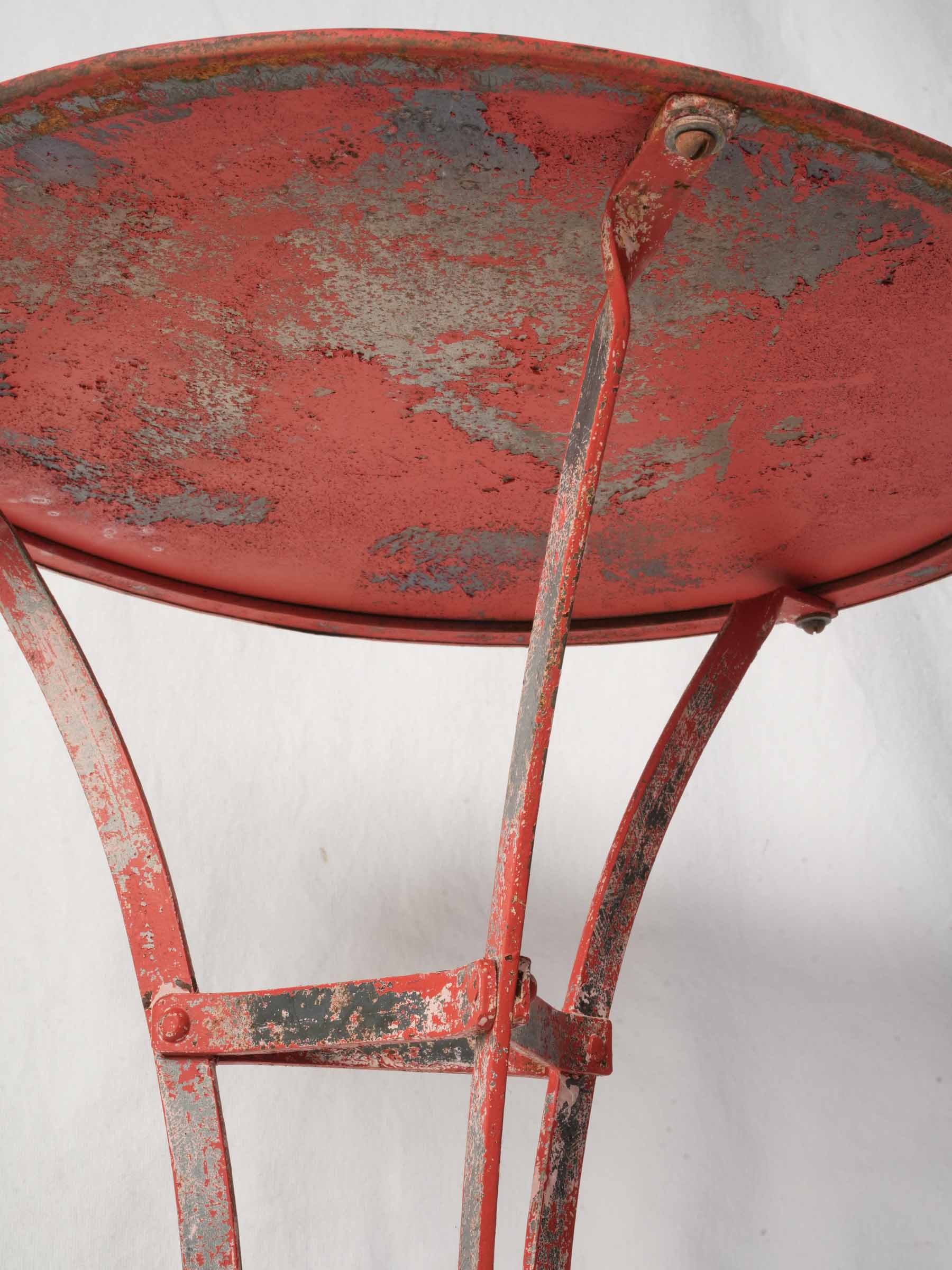 Stylish oxidized red pedestal table