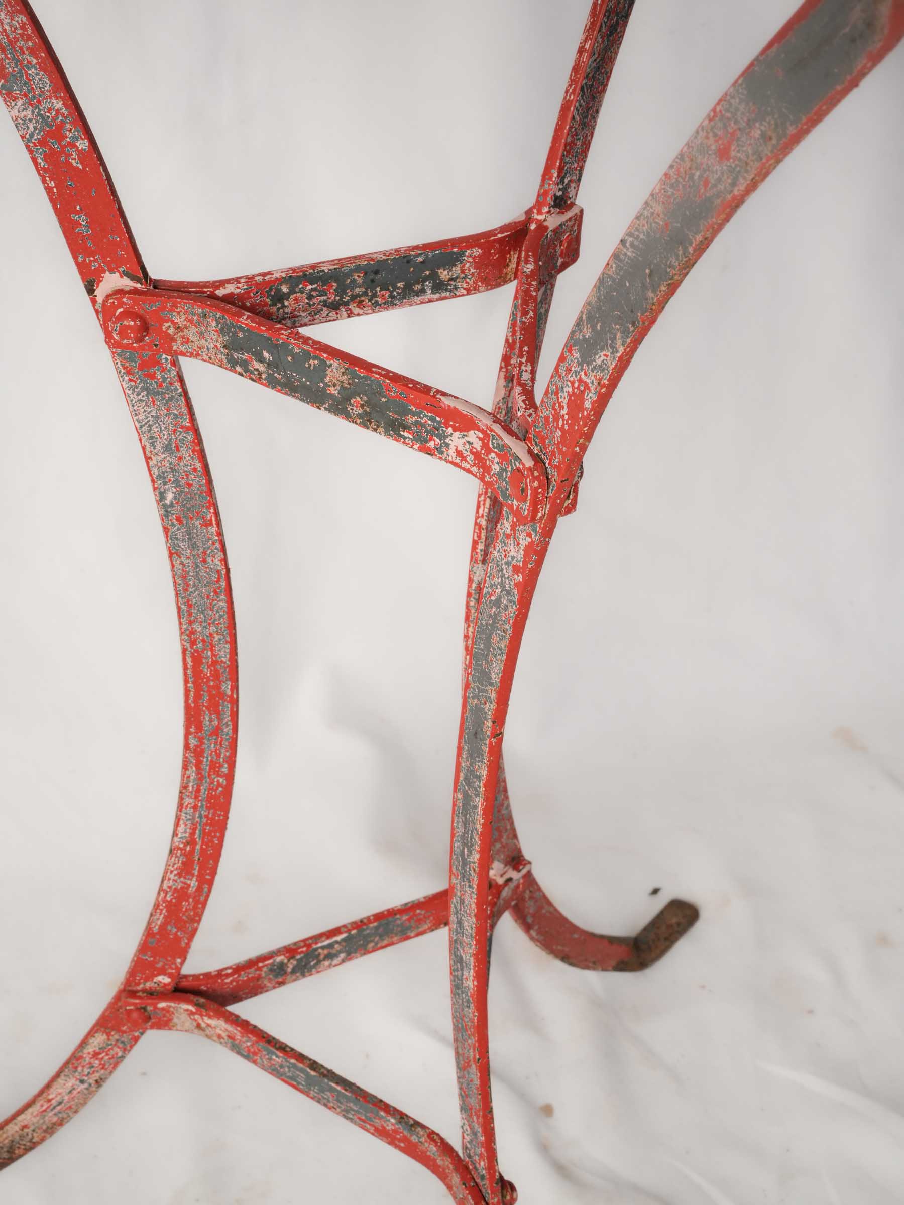 Authentically aged red café table