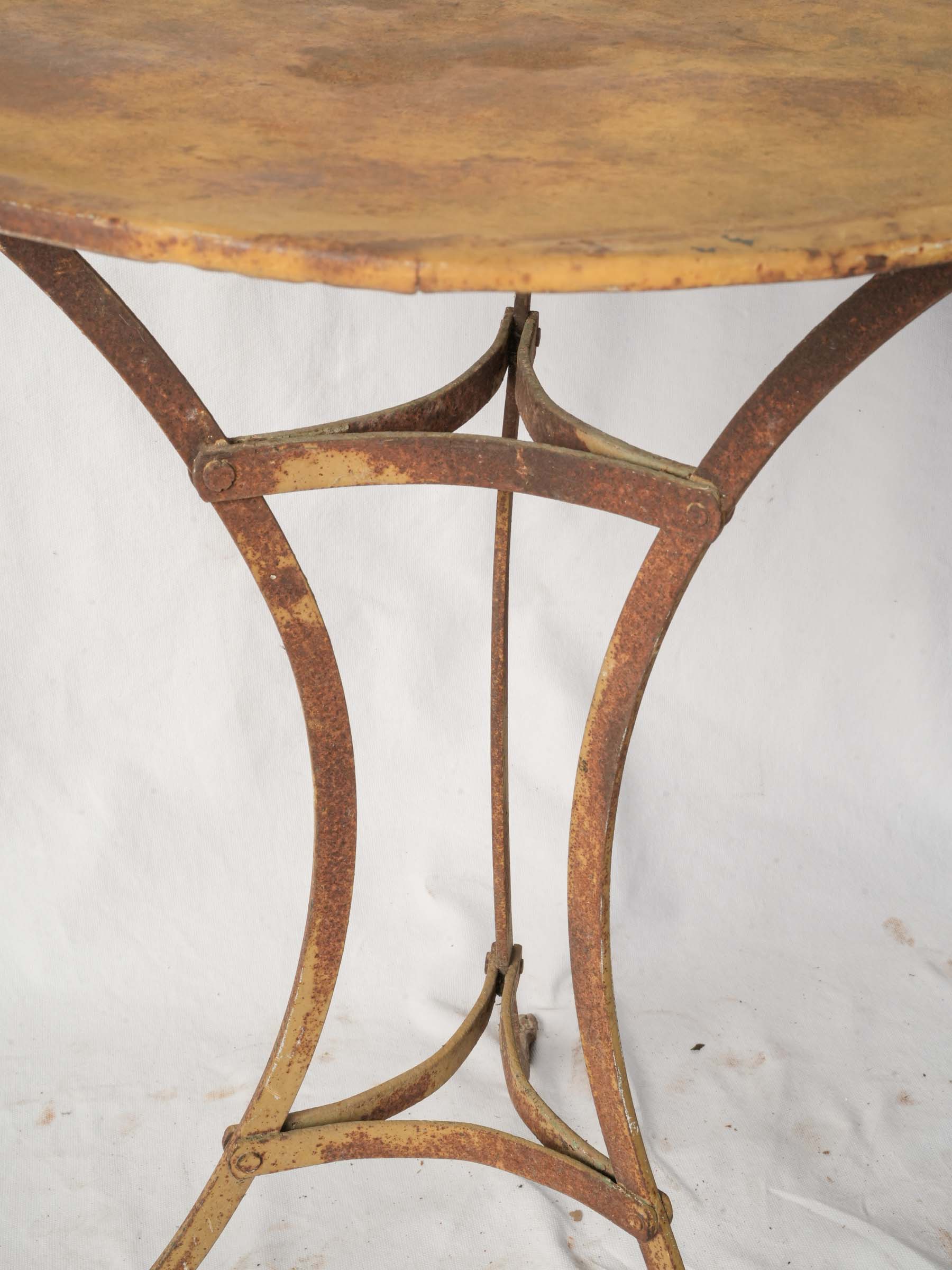 Lightweight yellow-painted metal table  
