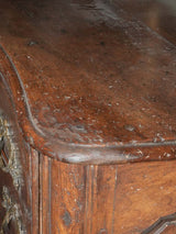 Antique French walnut commode with bronze hardware