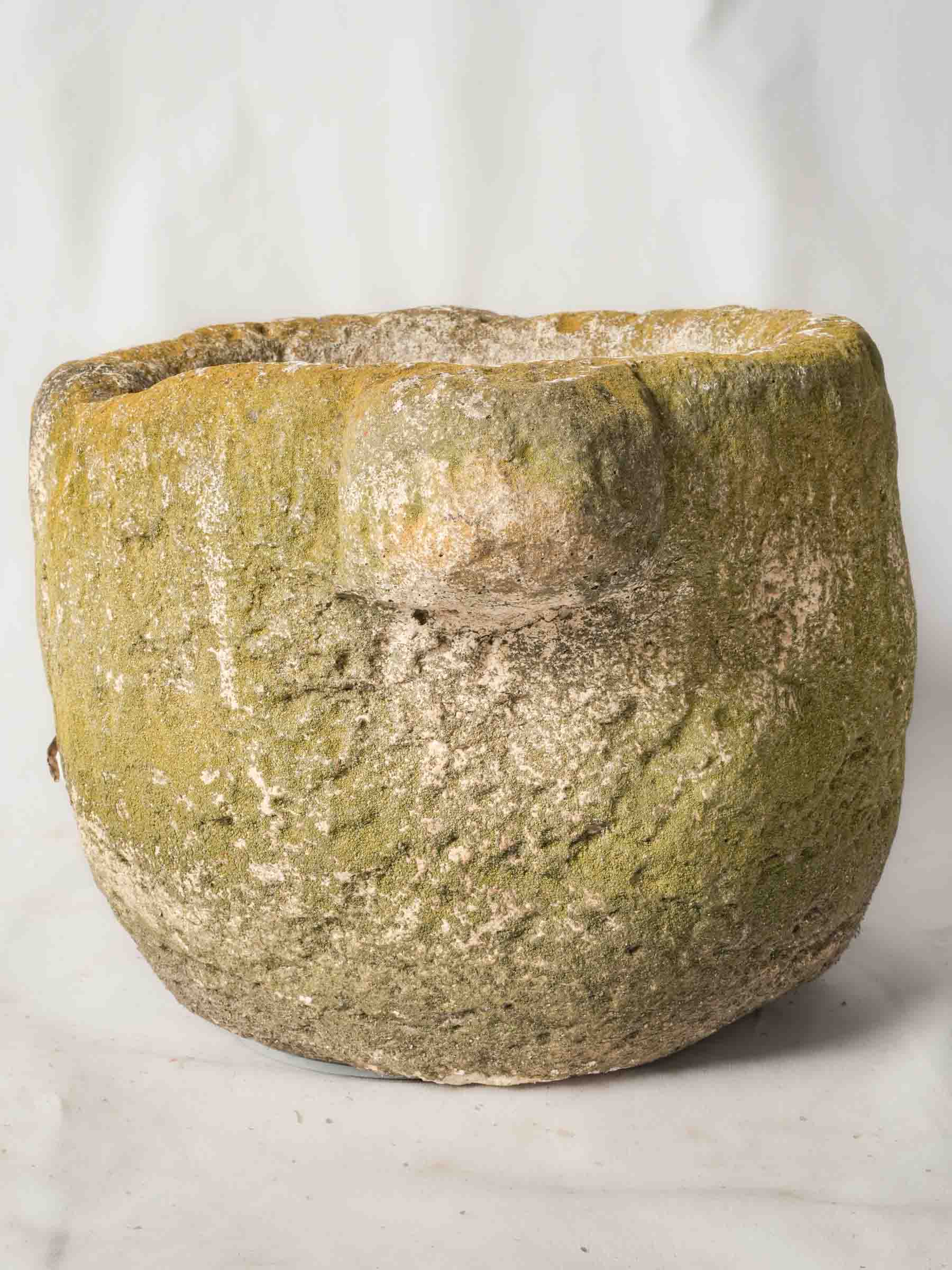 Rough-hewn antique mortar  