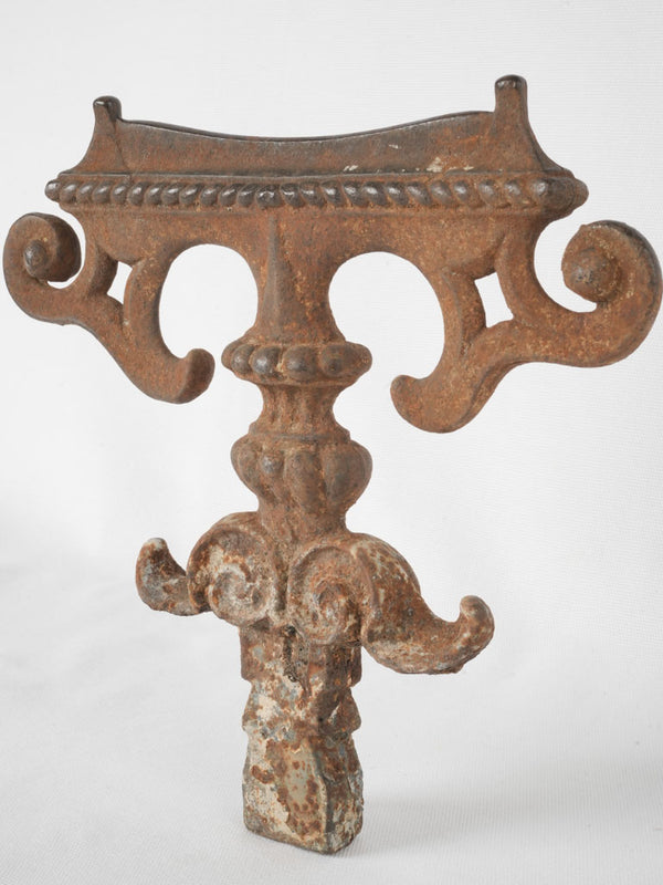 Antique ornate cast iron shoe scraper