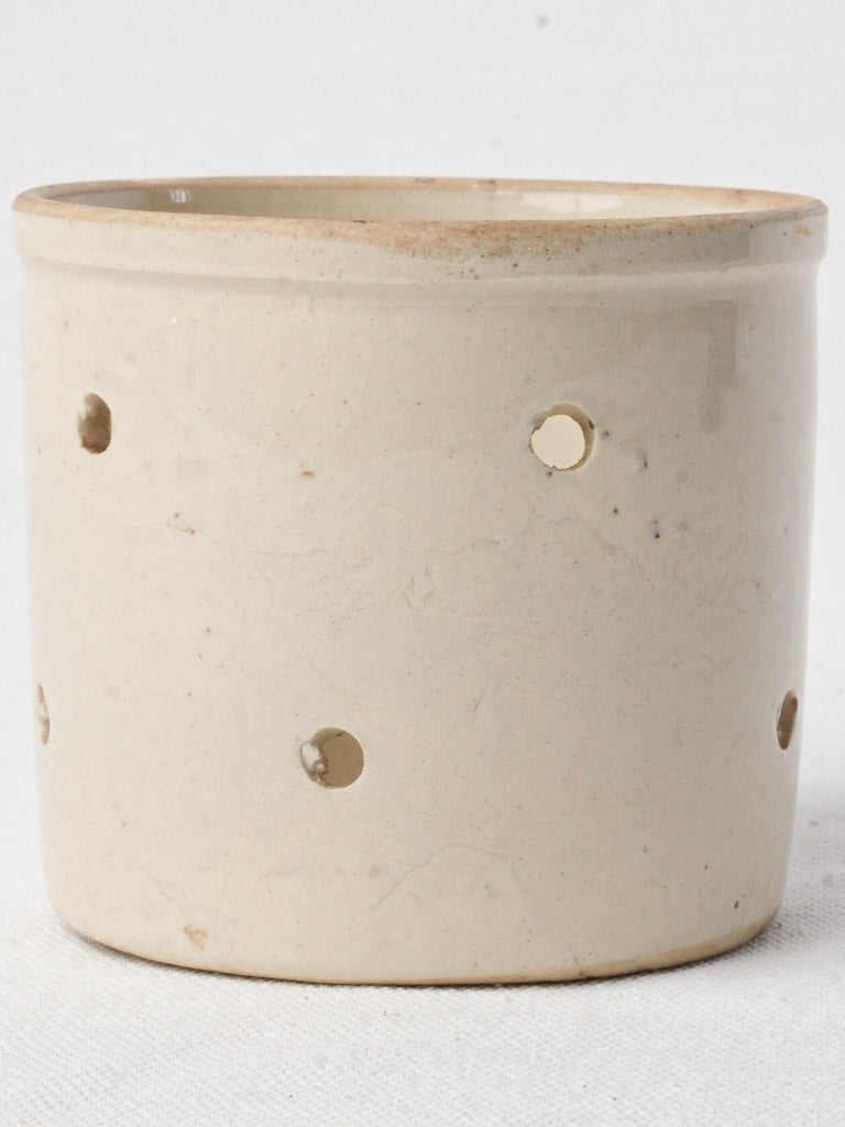 Rustic cylindrical cheese mold   