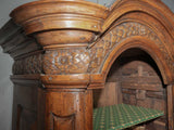 Artisan-carved, warm, antique walnut armoire