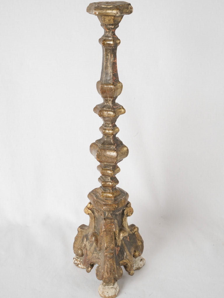 Timeworn ornate French candle holder