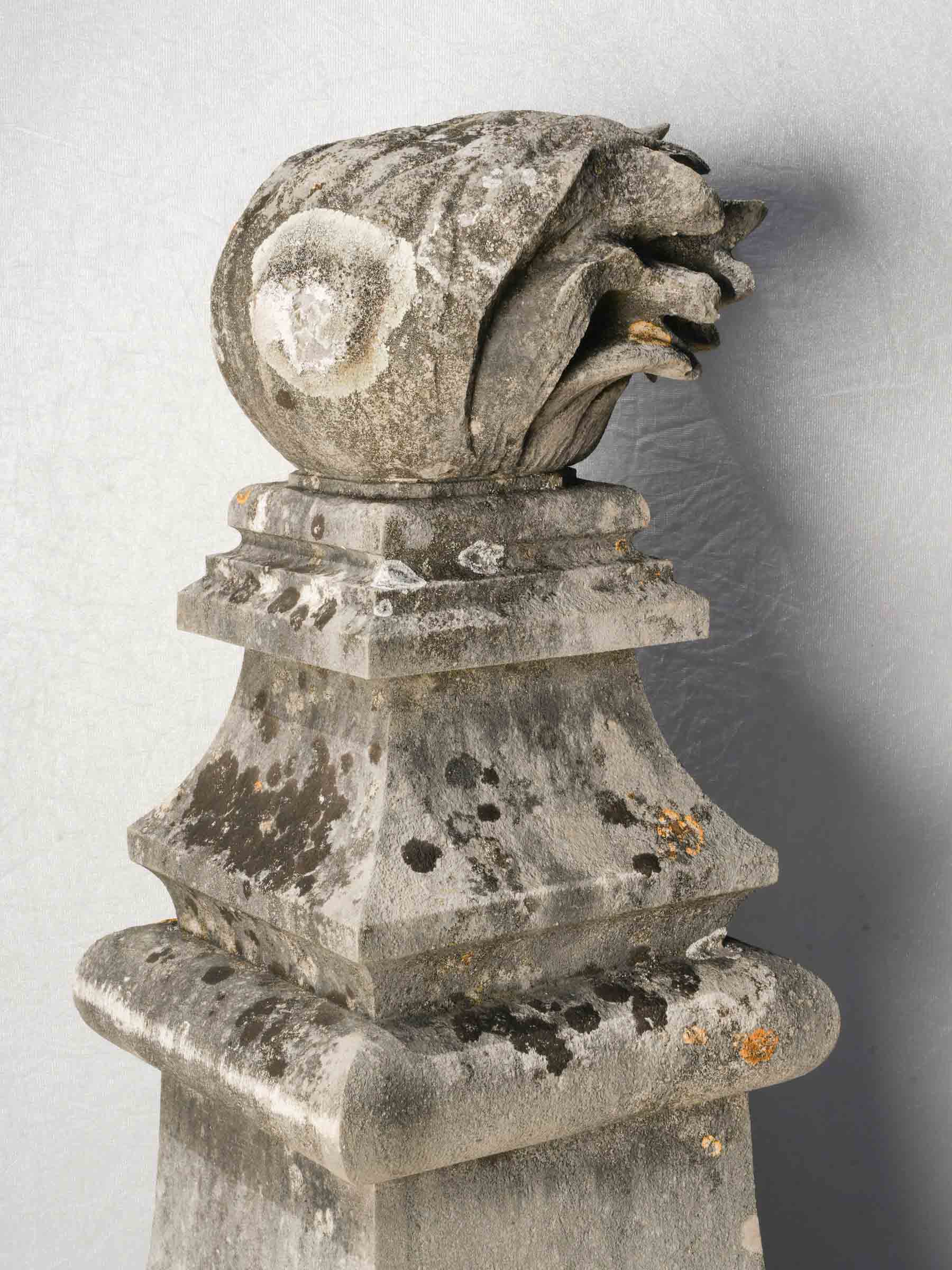 Artisan crafted stone flame finials