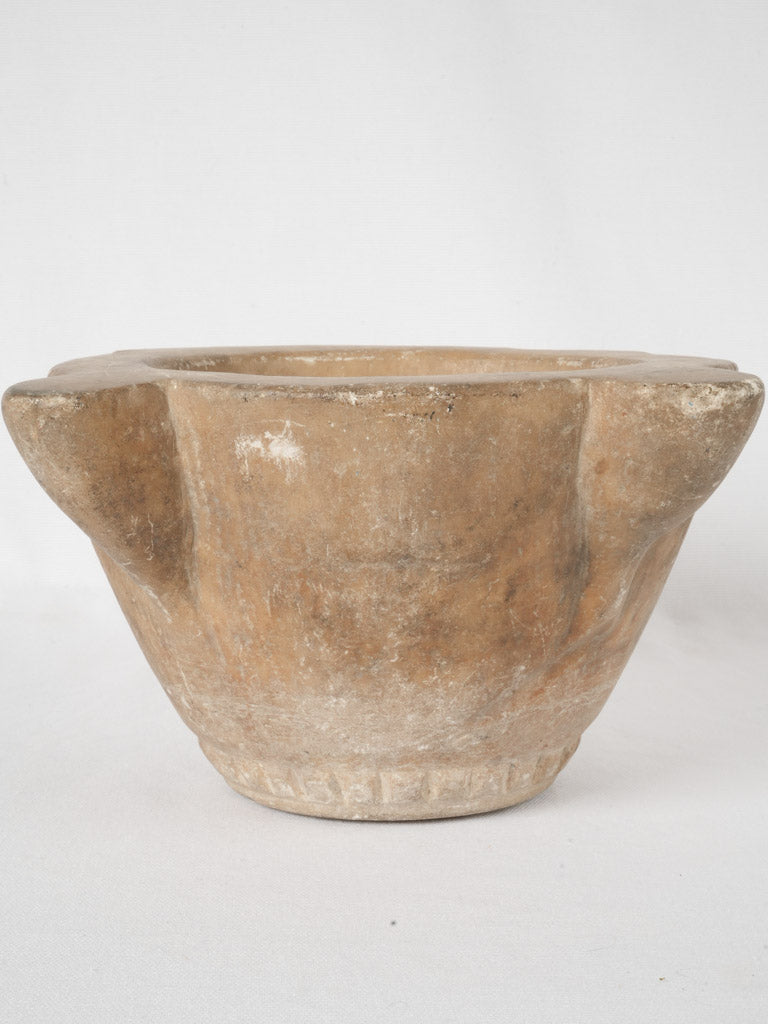 Curious lipped design marble mortar
