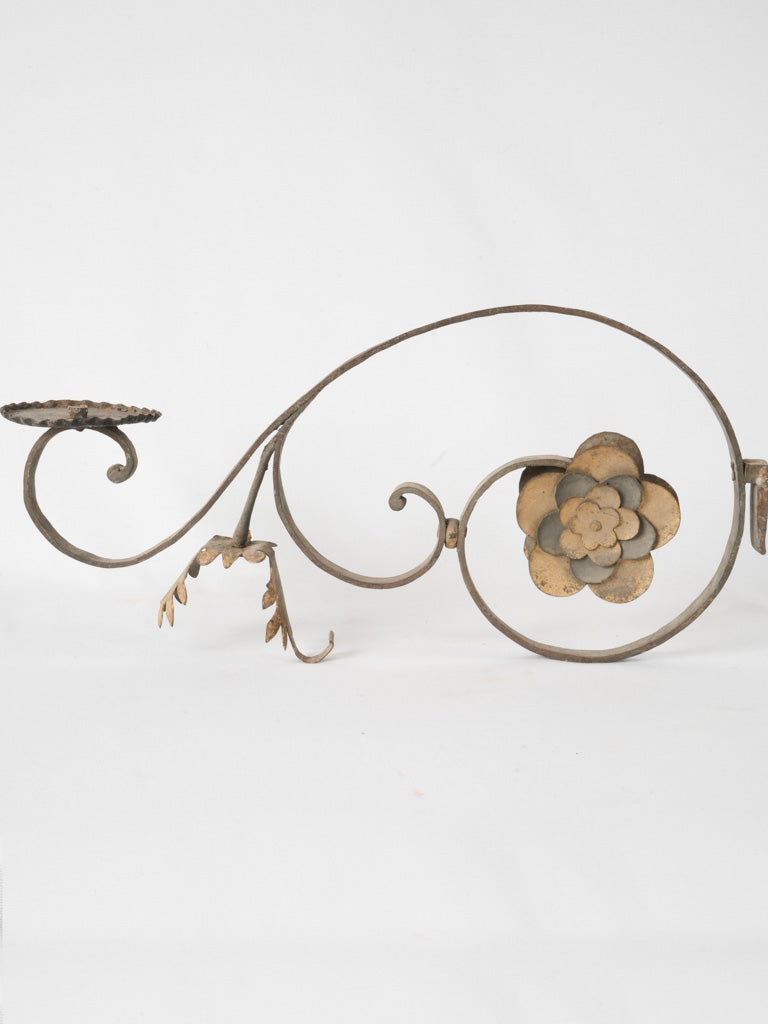 Elegant scrolled iron candle holder