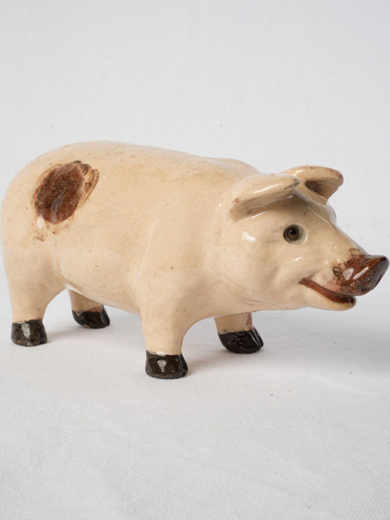 Antique glazed ceramic figurine