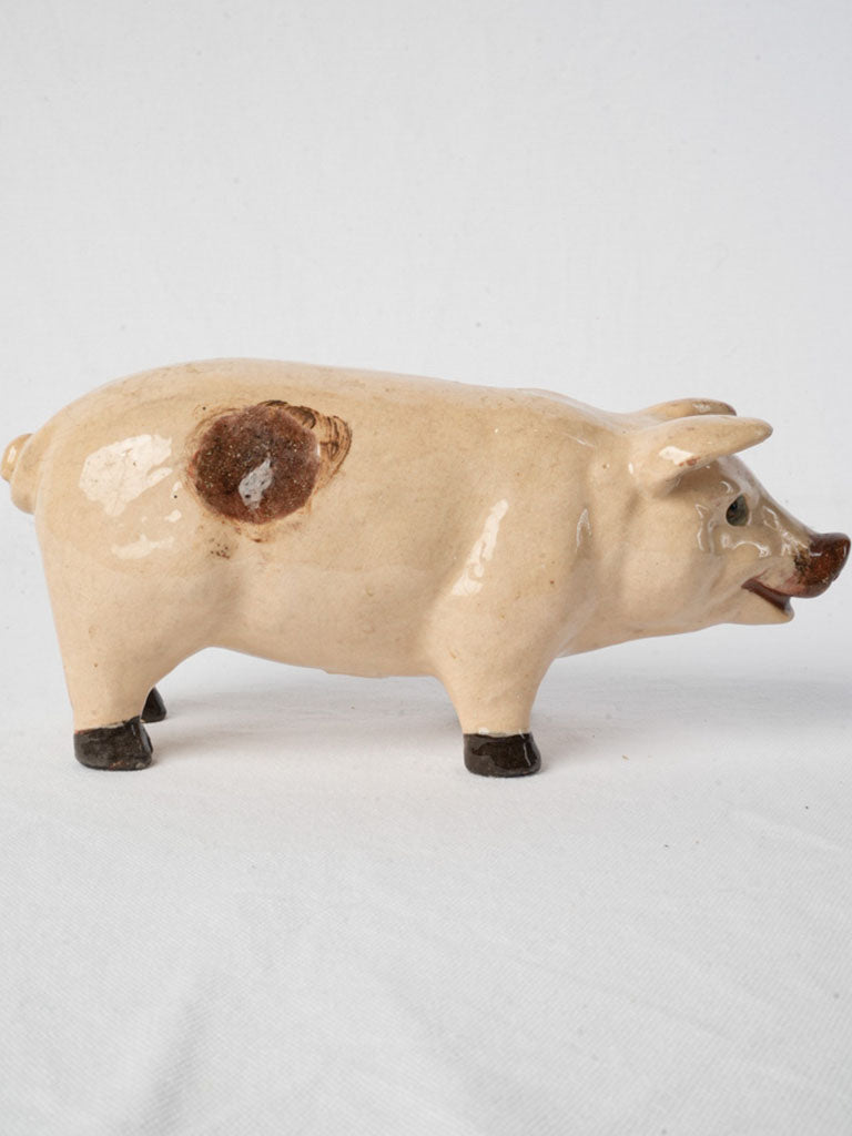 Cream-toned vintage pig statue
