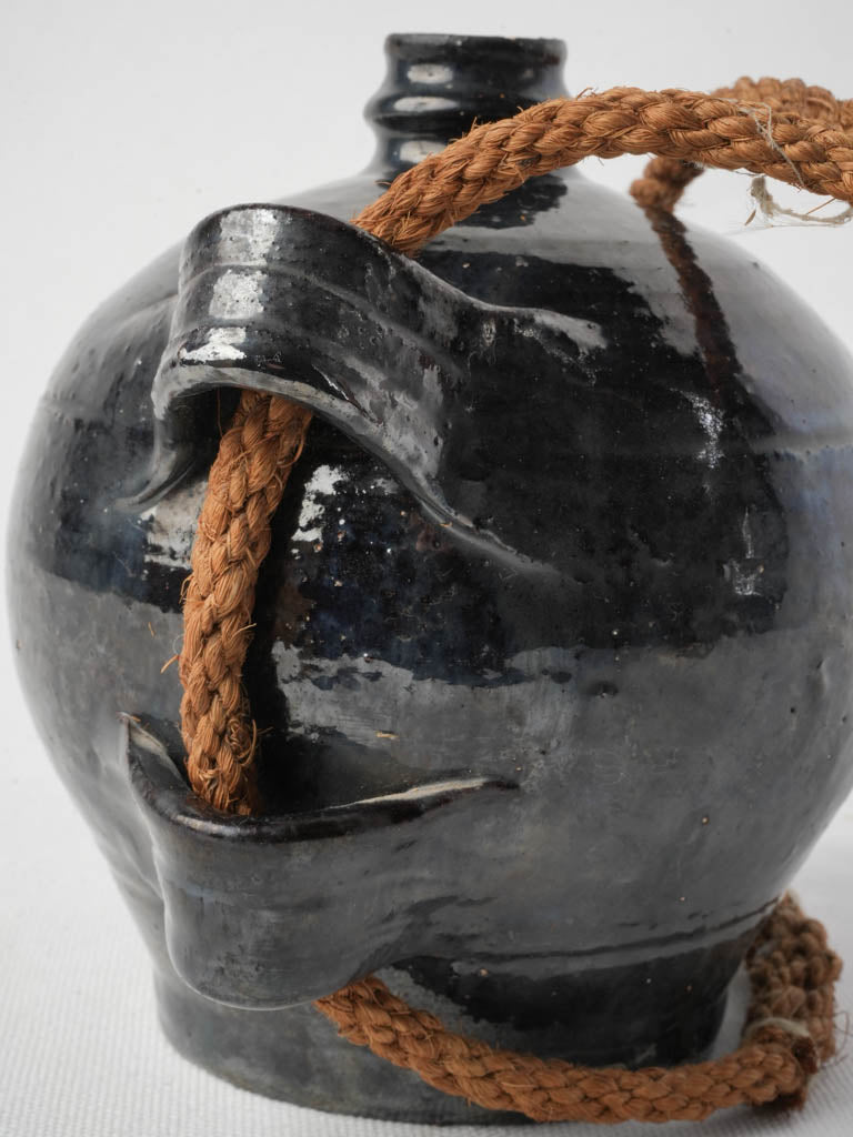 Decorative black rope-handle pottery  