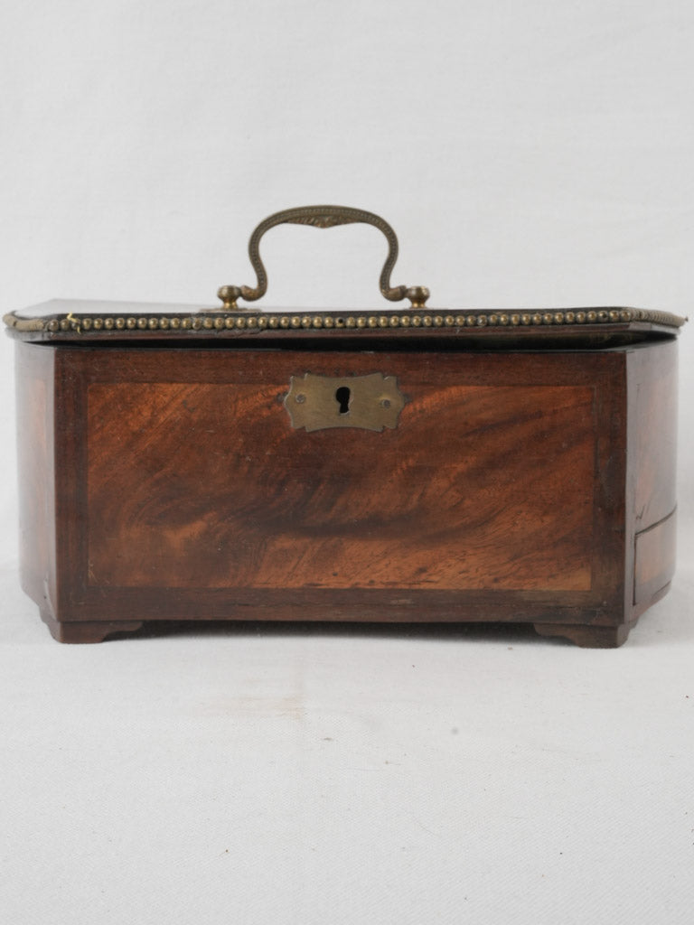 Aged brass-trimmed marquetry storage box 