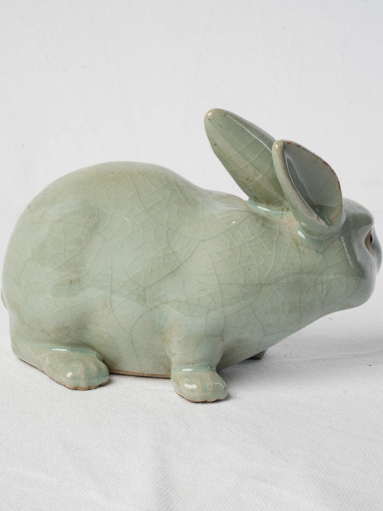 Attentive glazed ceramic rabbit piece  