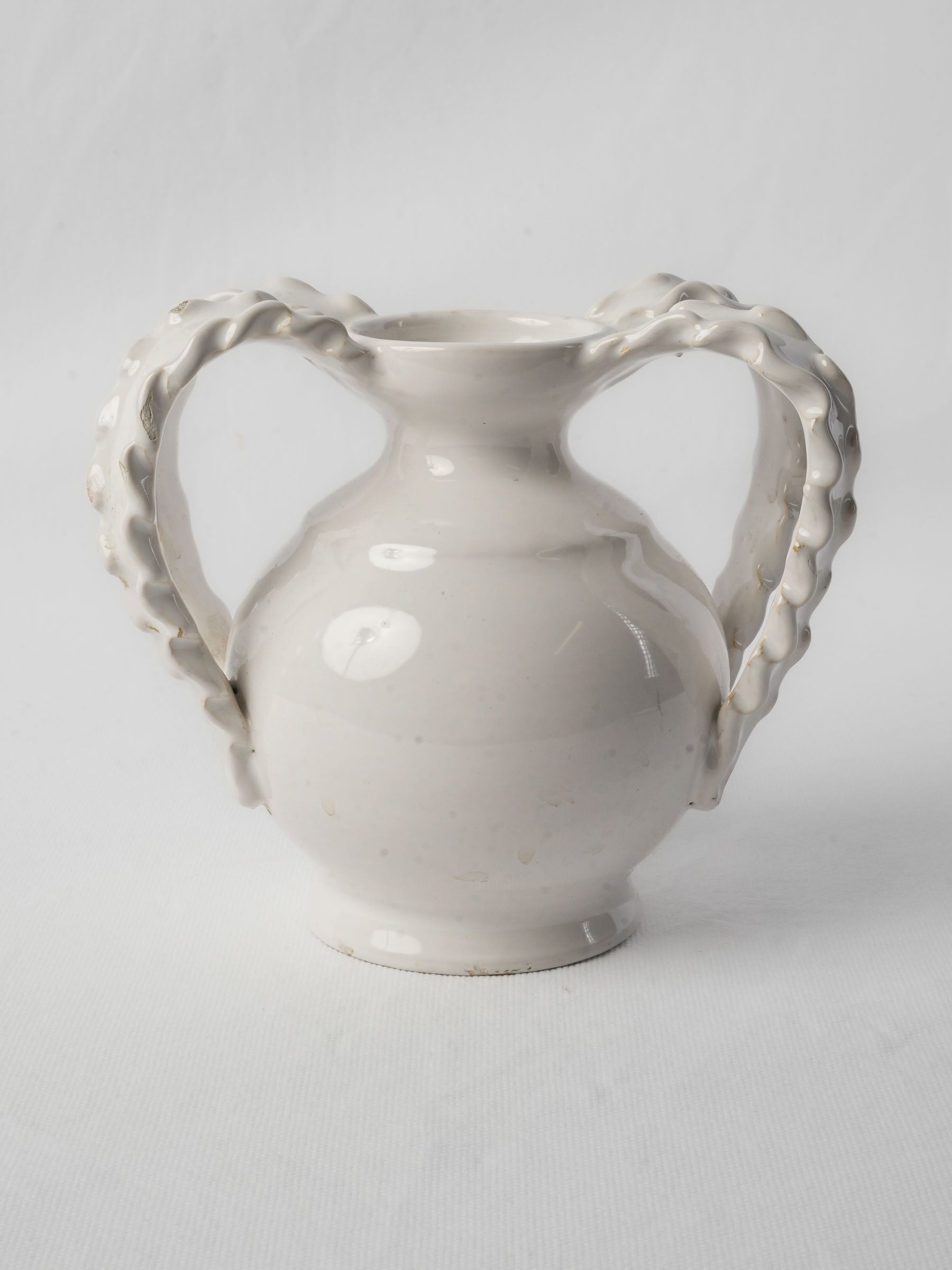 White glazed organic-form earthenware