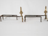 Elegant timeworn bronze firedogs set
