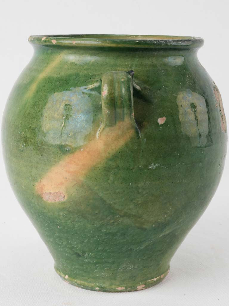 Vintage yellow-accented pottery confit jar