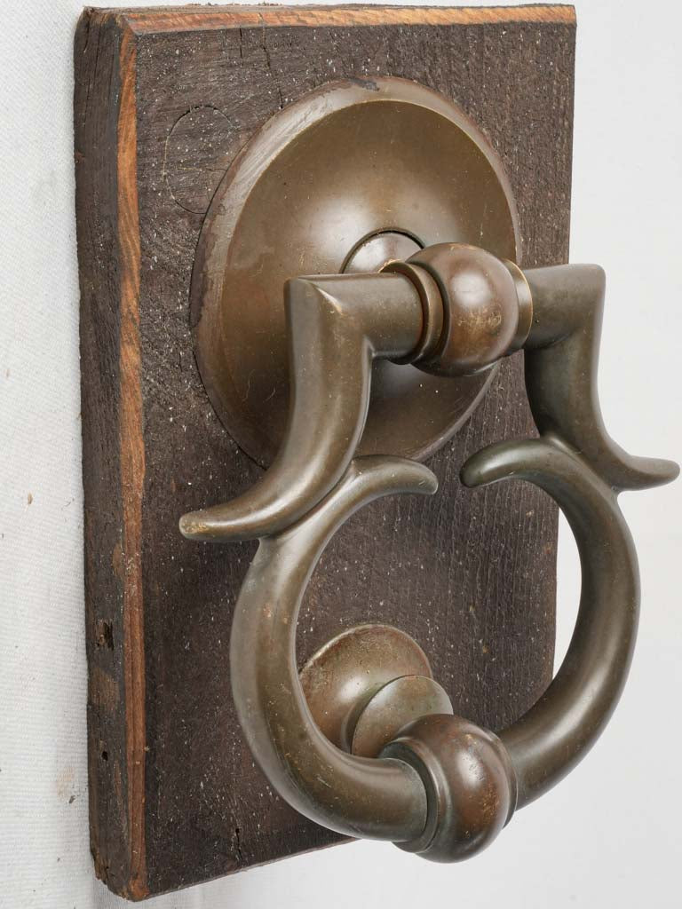 Unique ornate bronze knocker design