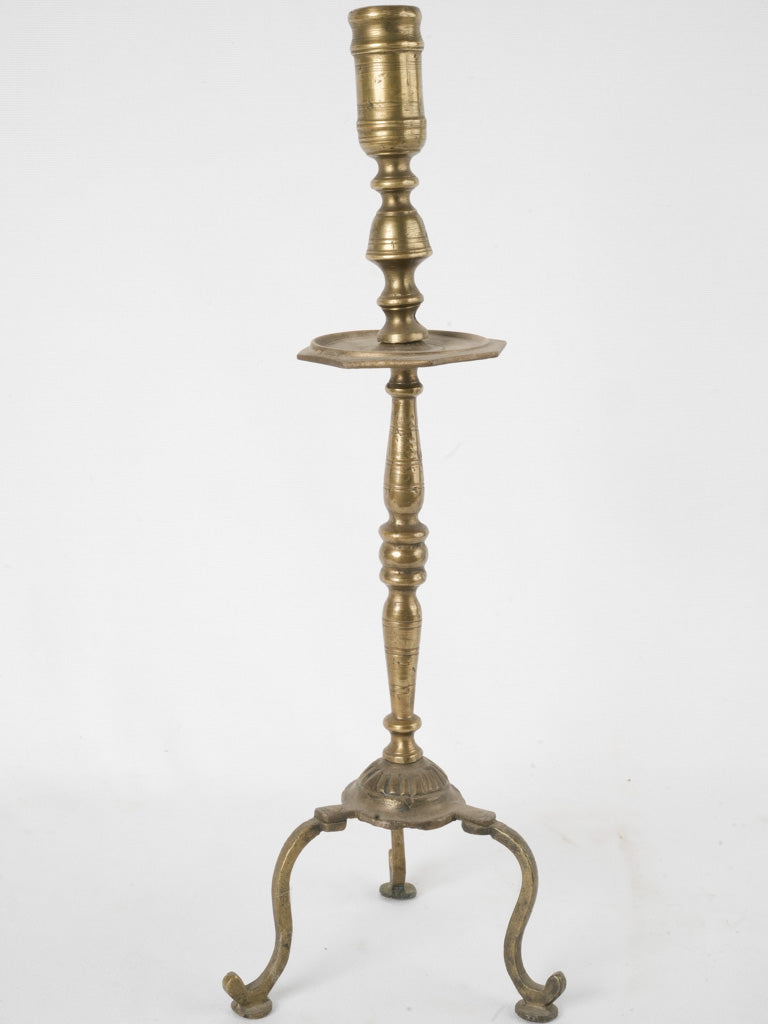 Rustic 19th-century bronze candlestick detail