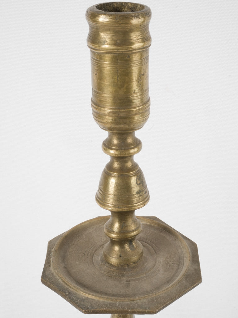 Elegant aged bronze decorative candlestick