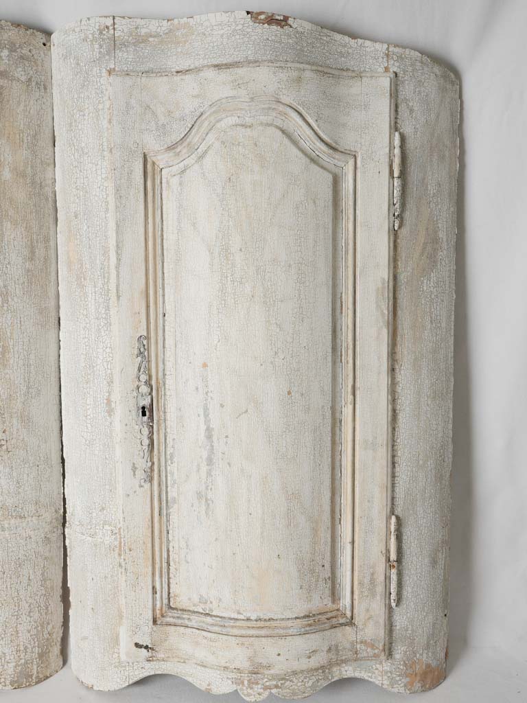 Elegant white-painted curved door panels