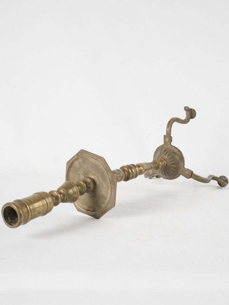 Time-worn bronze candlestick with character