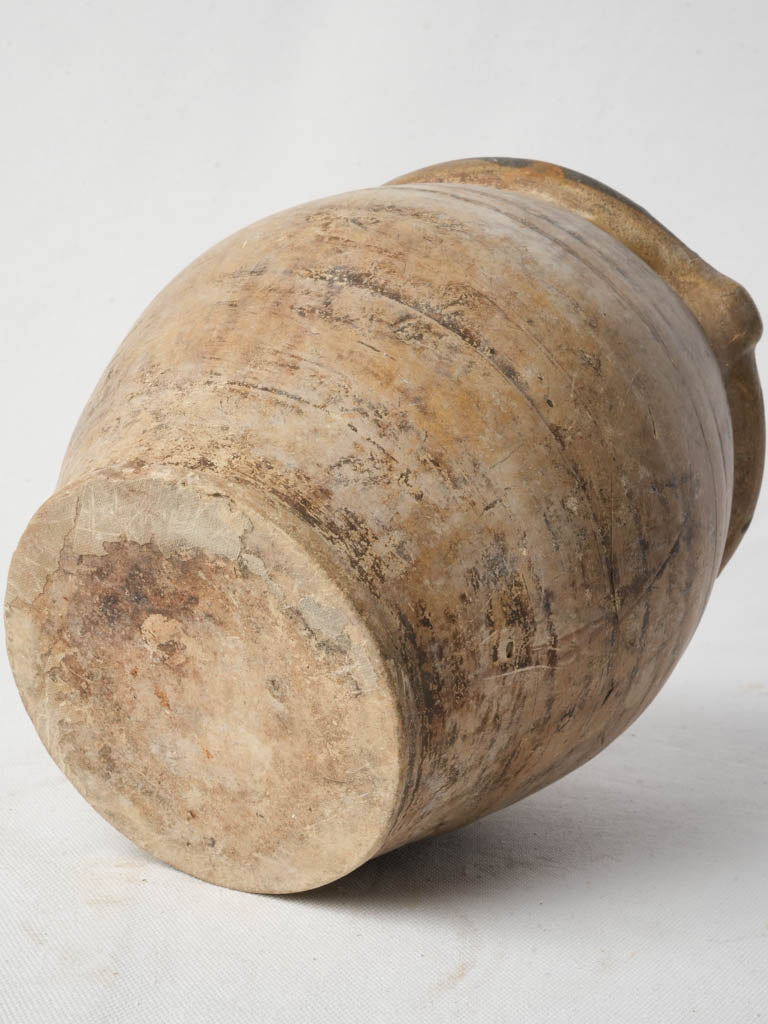 Umber-hued handmade terracotta pitcher  